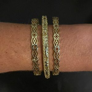 Never worn gold Kendra Scott bangles